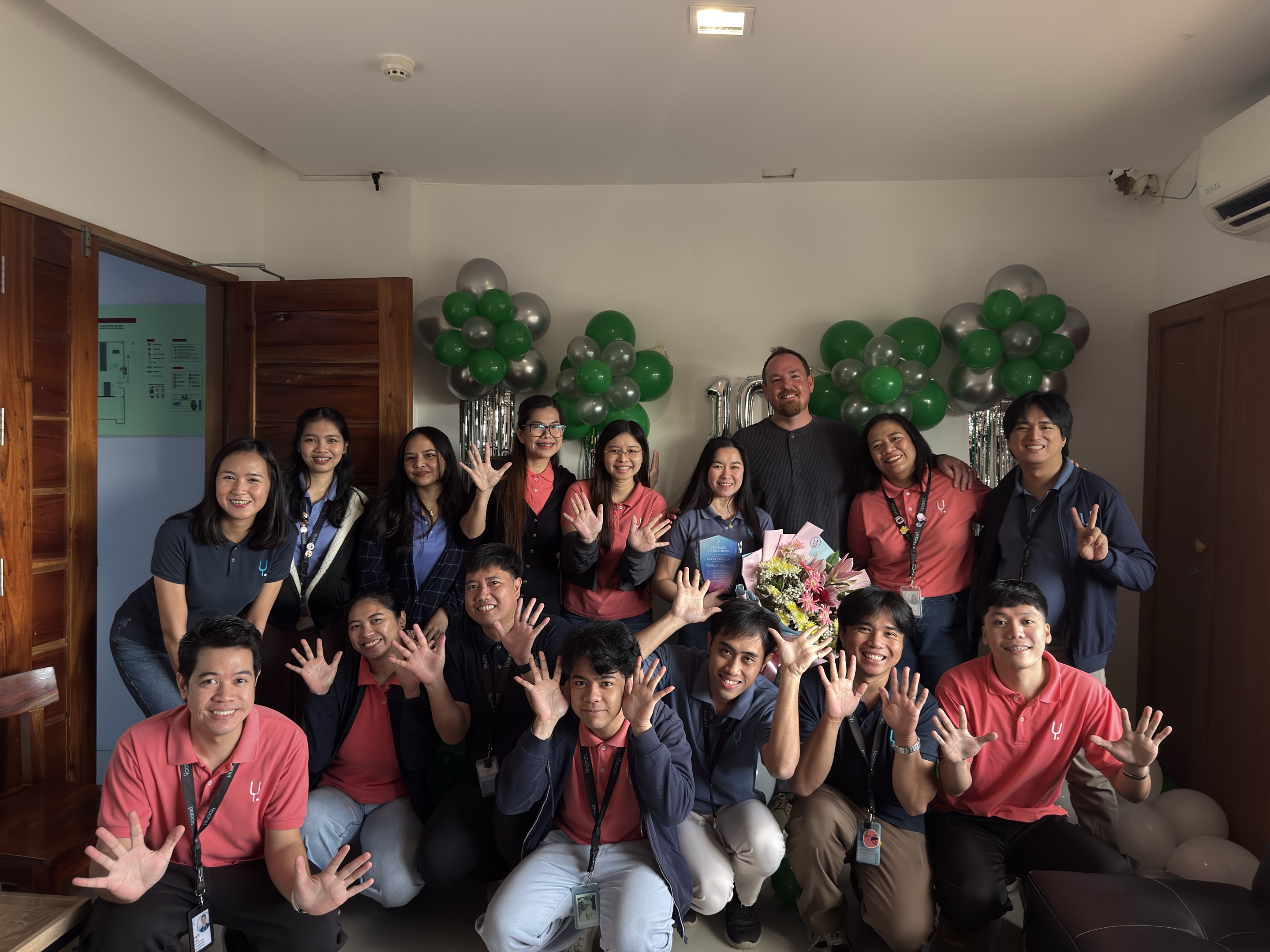 Ben with the Yoonet team, celebrating a ten year anniversary