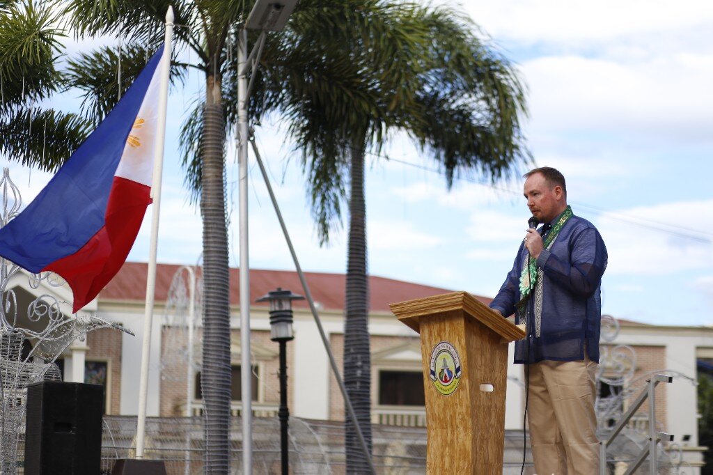 Ben Carter speaking at the Balanga City podium